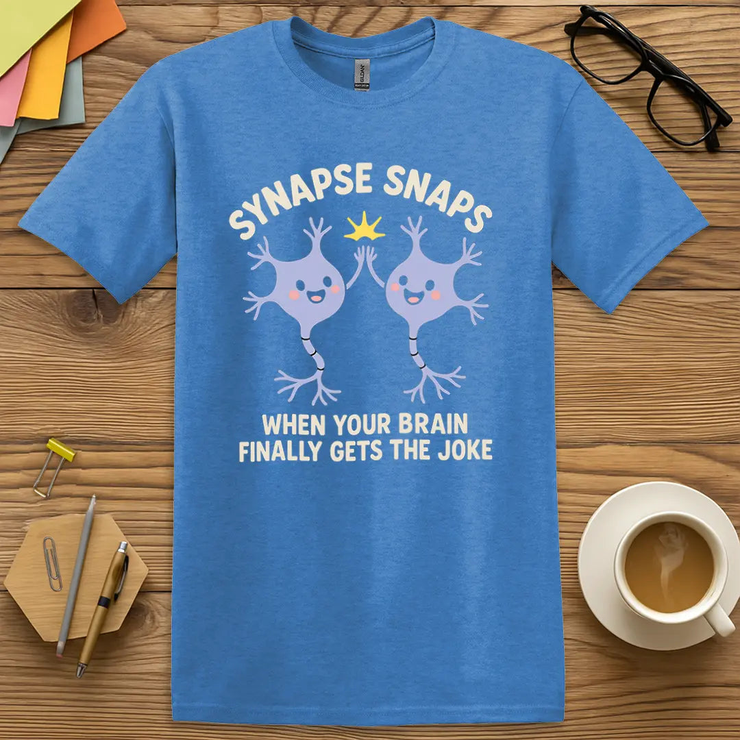 Heather Royal Color T-shirt with "Synapse Snaps: When Your Brain Finally Gets the Joke" design mixing vibrant color and science teacher flair.