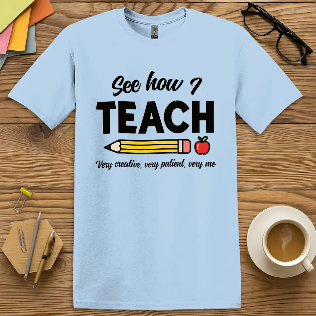 Light Blue Color T-shirt with "See how I TEACH" design for a soft tone and witty teacher energy.