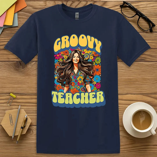 Navy Color T-shirt with "Groovy Teacher" design featuring retro psychedelic floral pattern and vintage educator vibe.