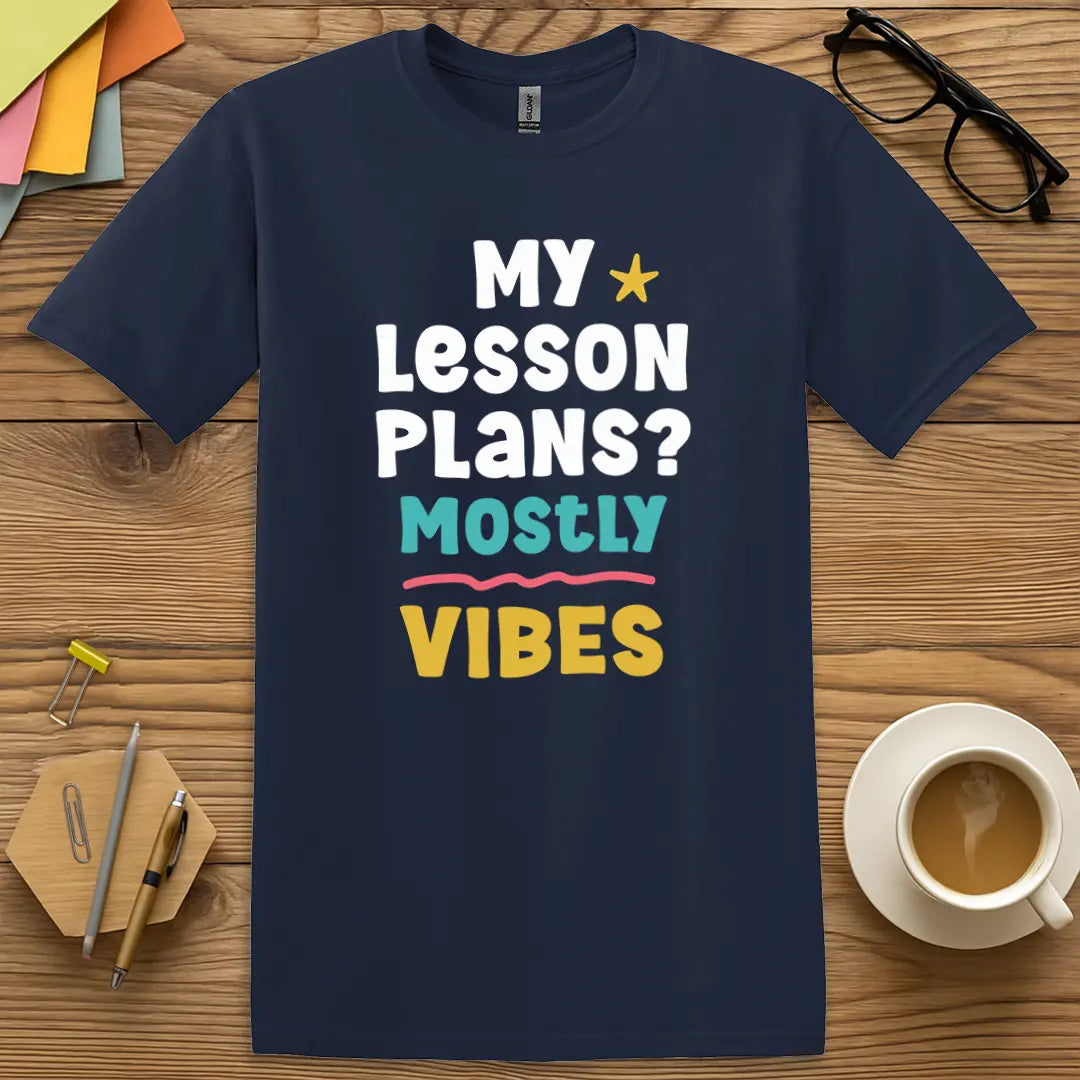 Navy Color T-shirt with "My Lesson Plans? Mostly Vibes" design with bold colors and classroom wing-it attitude.