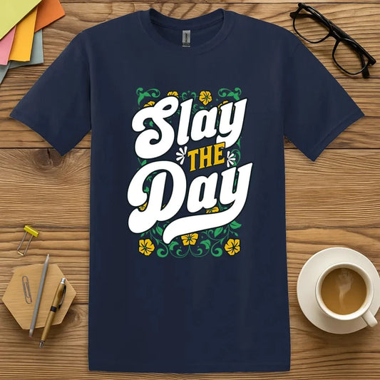 Navy T-shirt with “Slay The Day” design featuring bold white lettering and floral green/yellow background for confident classroom style