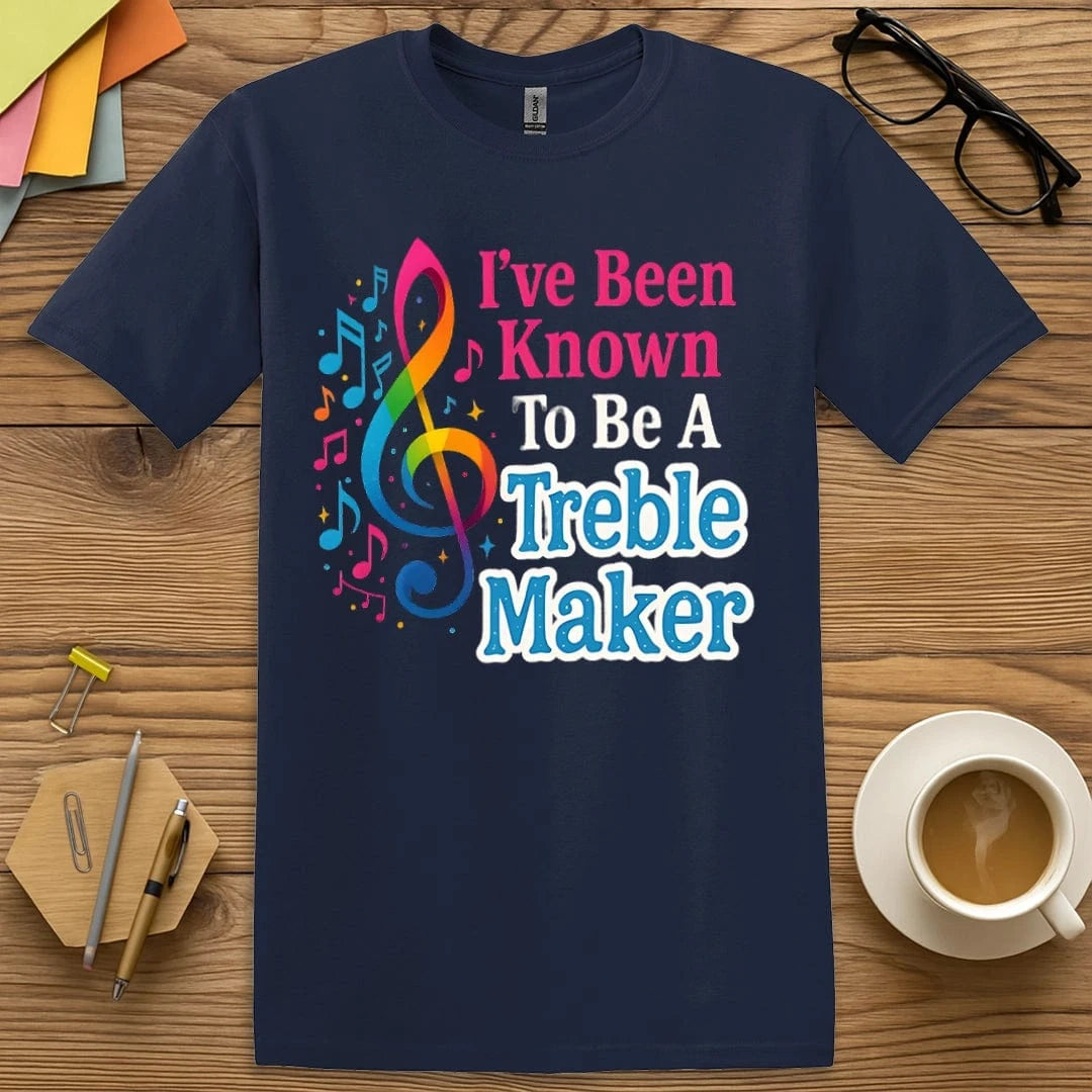 Navy T-shirt with vibrant "I’ve Been Known to Be a Treble Maker" phrase and colorful music note design.