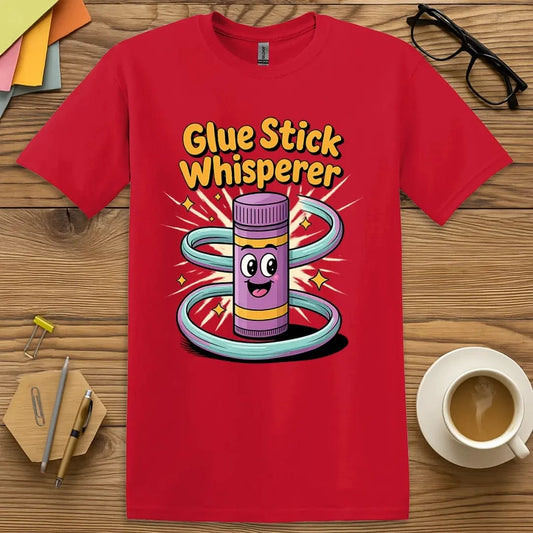 Red Glue Stick Whisperer T-Shirt – Bold and playful tee for educators who keep creativity flowing and classroom supplies under control.