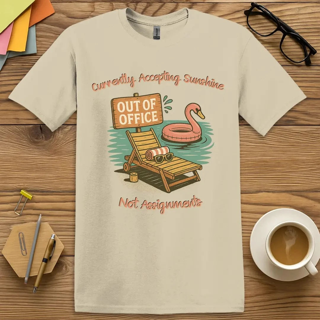 Sand T-shirt with witty “Out of Office” print – a must-have for teachers embracing sunshine over schoolwork
